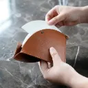 حافظة فلاتر جلدية لون بني 